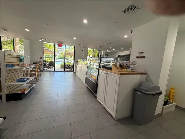 a kitchen with a sink and counter top space