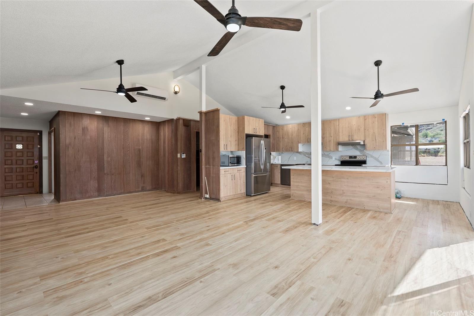 87-1087 Apuupuu Road Waianae, HI 96792 - Photo 5 of 25 a view of a kitchen with a sink and a refrigerator