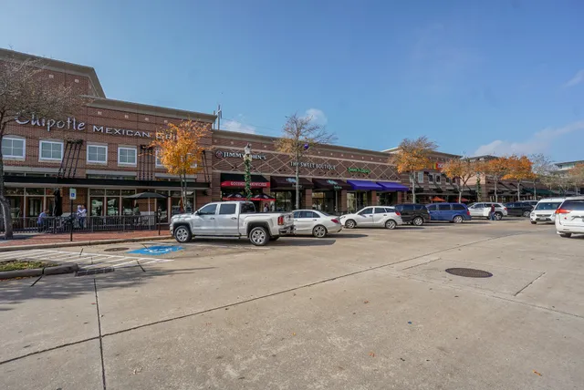 a car parked in front of a building