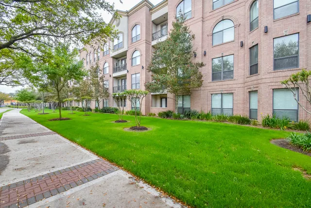 front view of a building with a yard