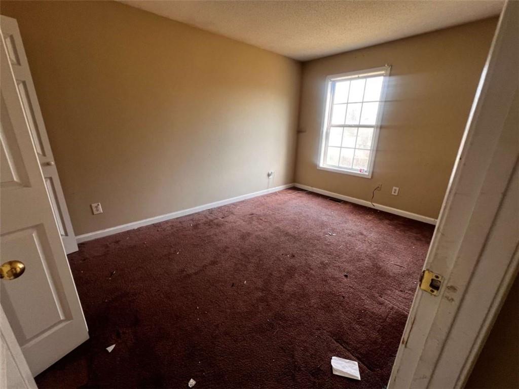 3648 Sapphire Court Decatur, GA 30034 - Photo 11 of 16 an empty room with windows