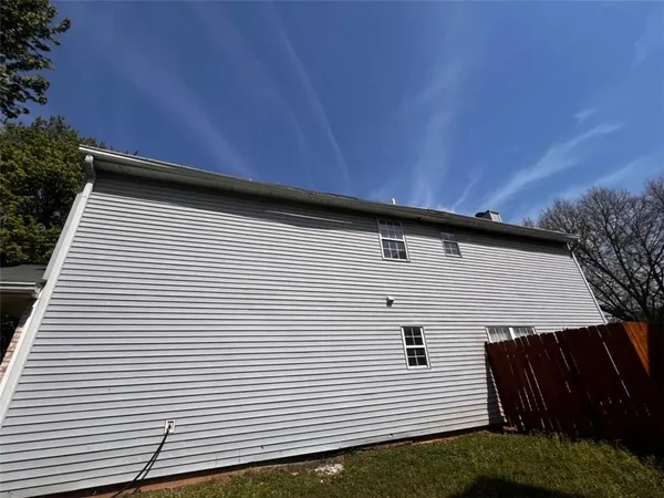 a view of a house with a garage