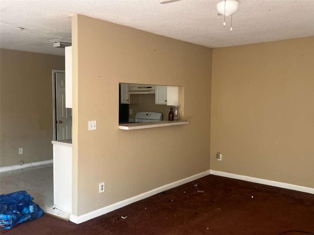 3648 Sapphire Court Decatur, GA 30034 - Photo 5 of 16 a view of a room with wooden floor and ceiling fan