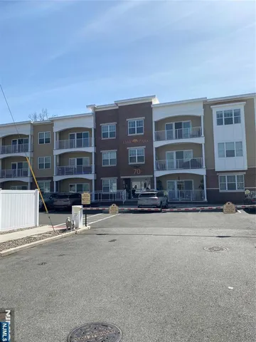 a view of a building with a street