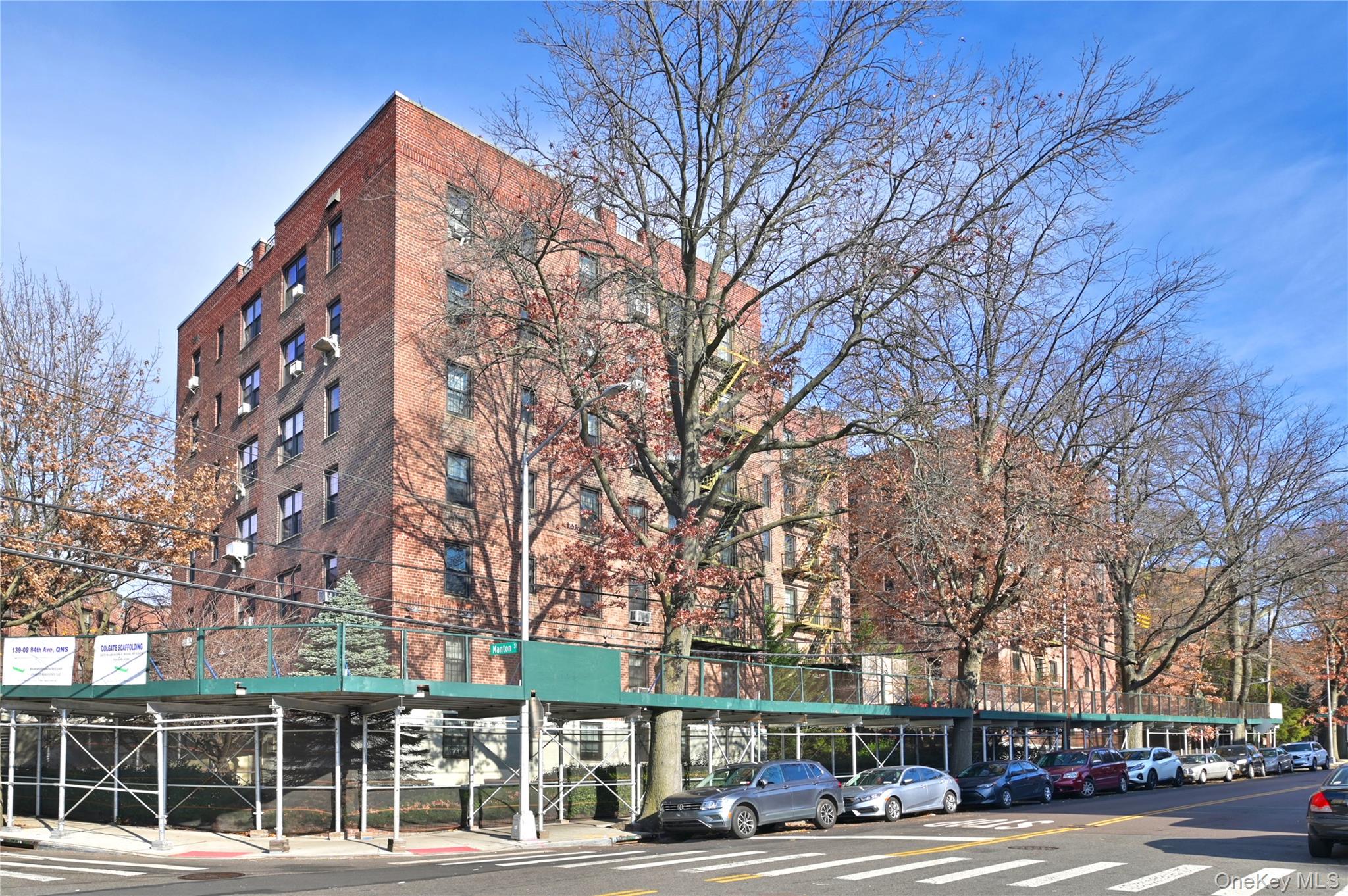 139-09 84th Drive, Unit 306 Queens, NY 11435 - Photo 12 of 12 View of apartment building / complex