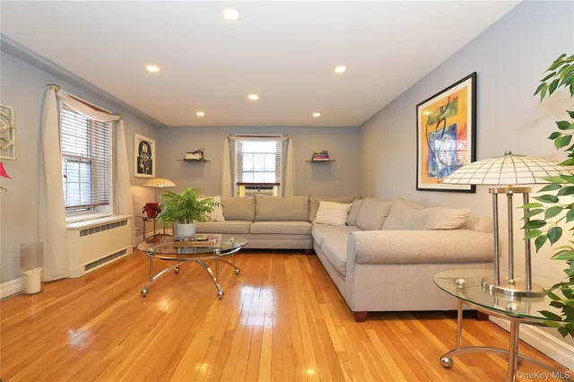 a living room with furniture and a table