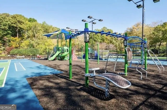 a view of a swimming pool with a yard