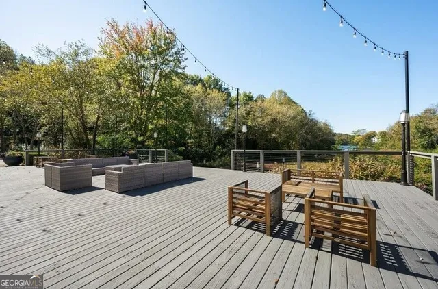 a view of outdoor space with table and chairs
