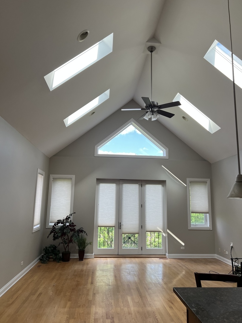 Undisclosed Address Chicago, IL 60613 - Photo 2 of 10 a room with gym equipment