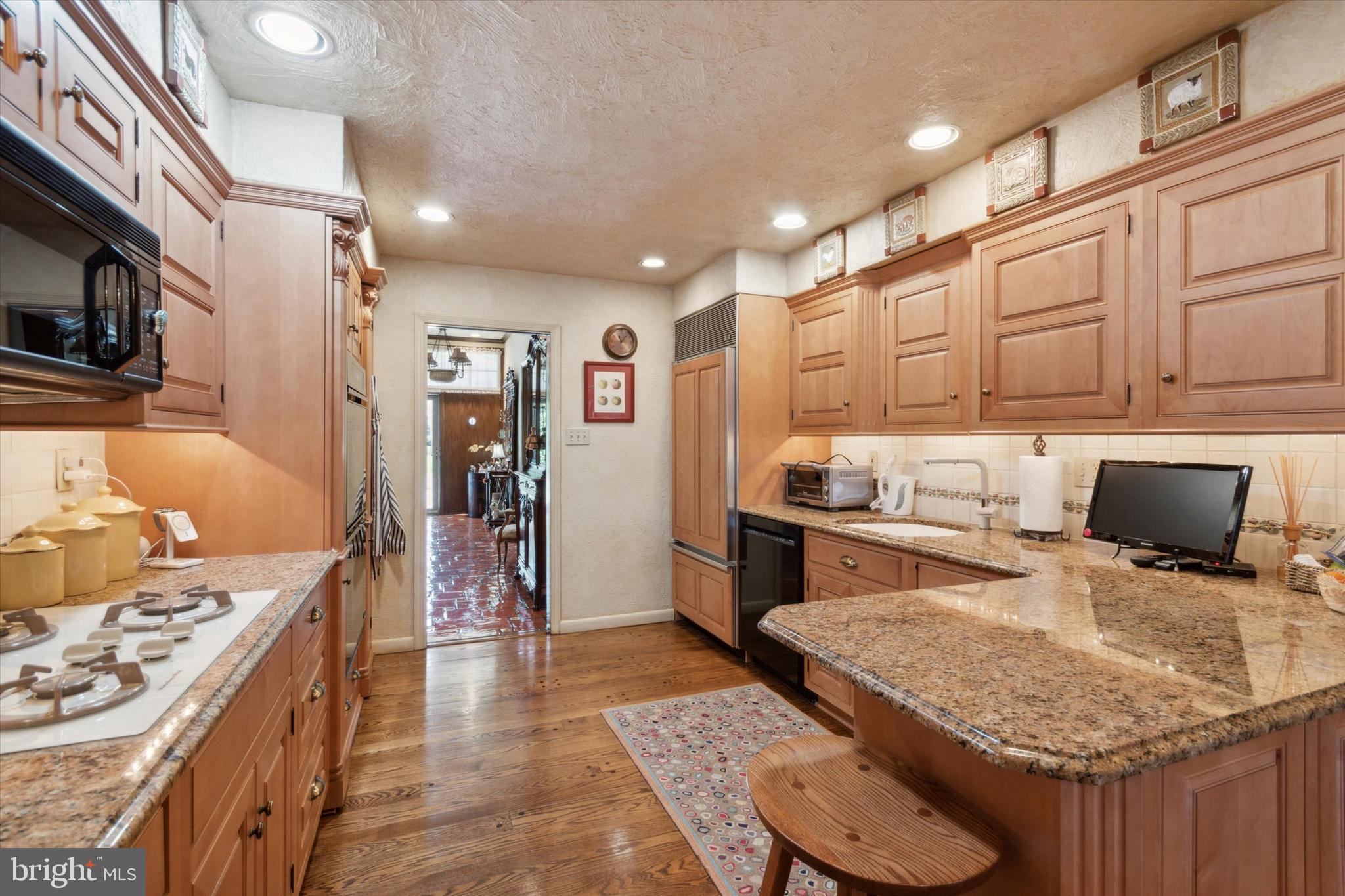 1080 Squirrel Road Jenkintown, PA 19046 - Photo 18 of 68 Granite counters w custom wood cabinetry