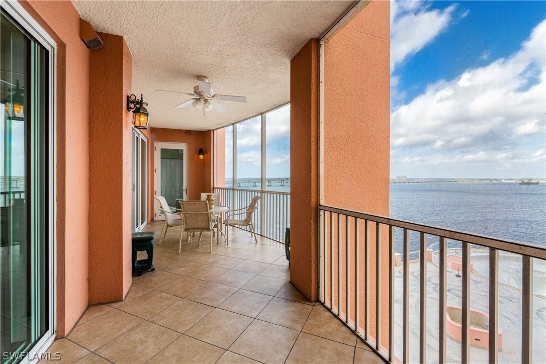a view of a balcony with chairs