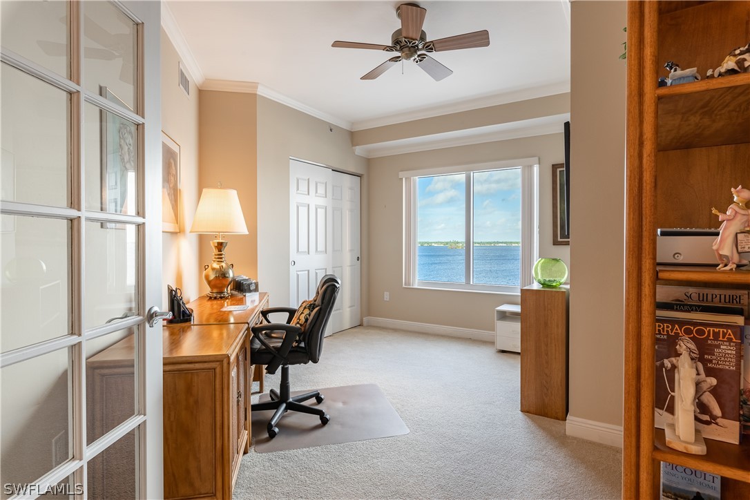 2743 First Street, Unit 602 Fort Myers, FL 33916 - Photo 25 of 38 a view of a workspace with furniture and a window