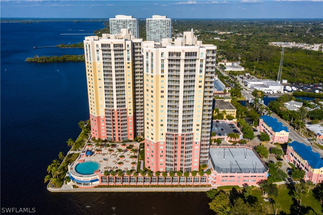 2743 First Street, Unit 602 Fort Myers, FL 33916 - Photo 36 of 38 view of balcony with outdoor seating
