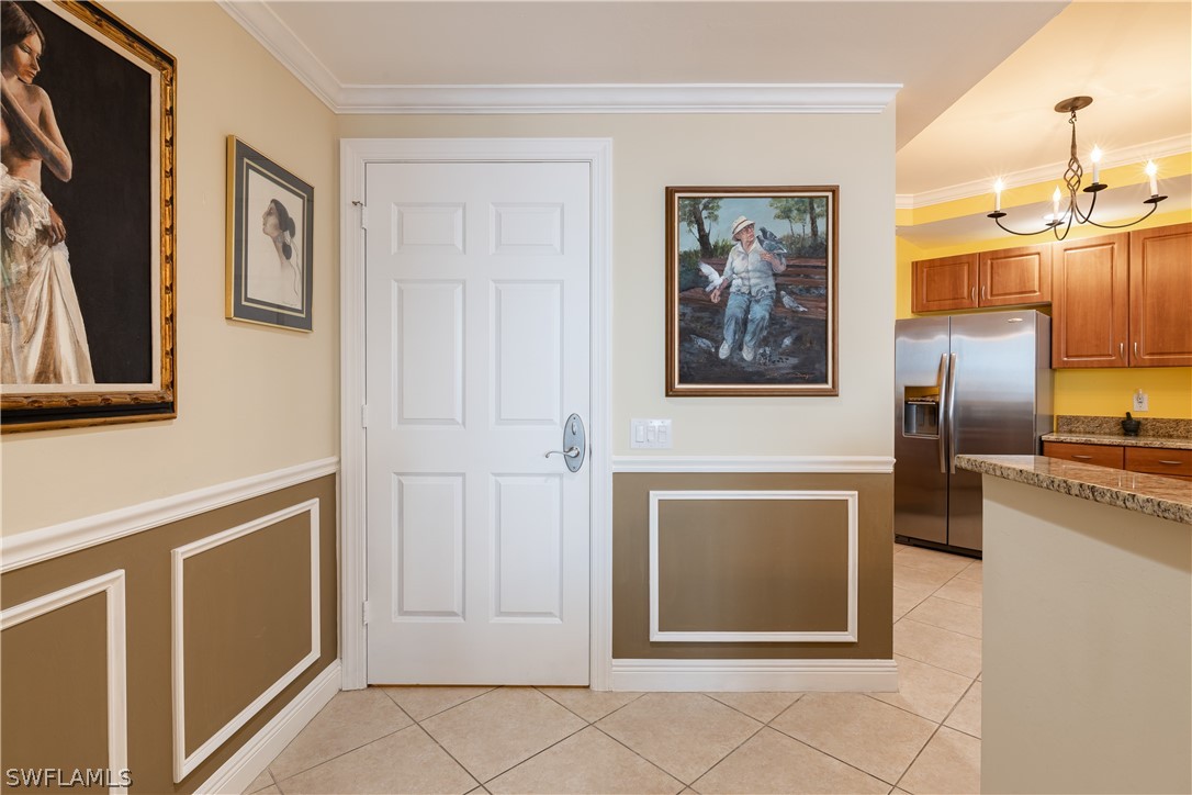 2743 First Street, Unit 602 Fort Myers, FL 33916 - Photo 4 of 38 a view of a livingroom with an entryway and kitchen view