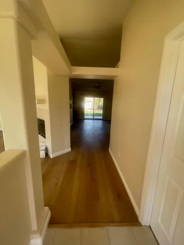 a view of an empty room and window