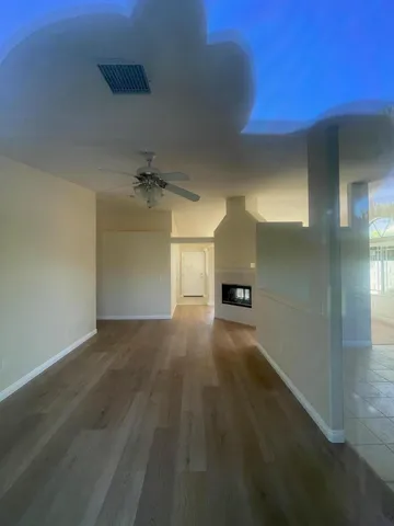 a view of a livingroom with a fireplace