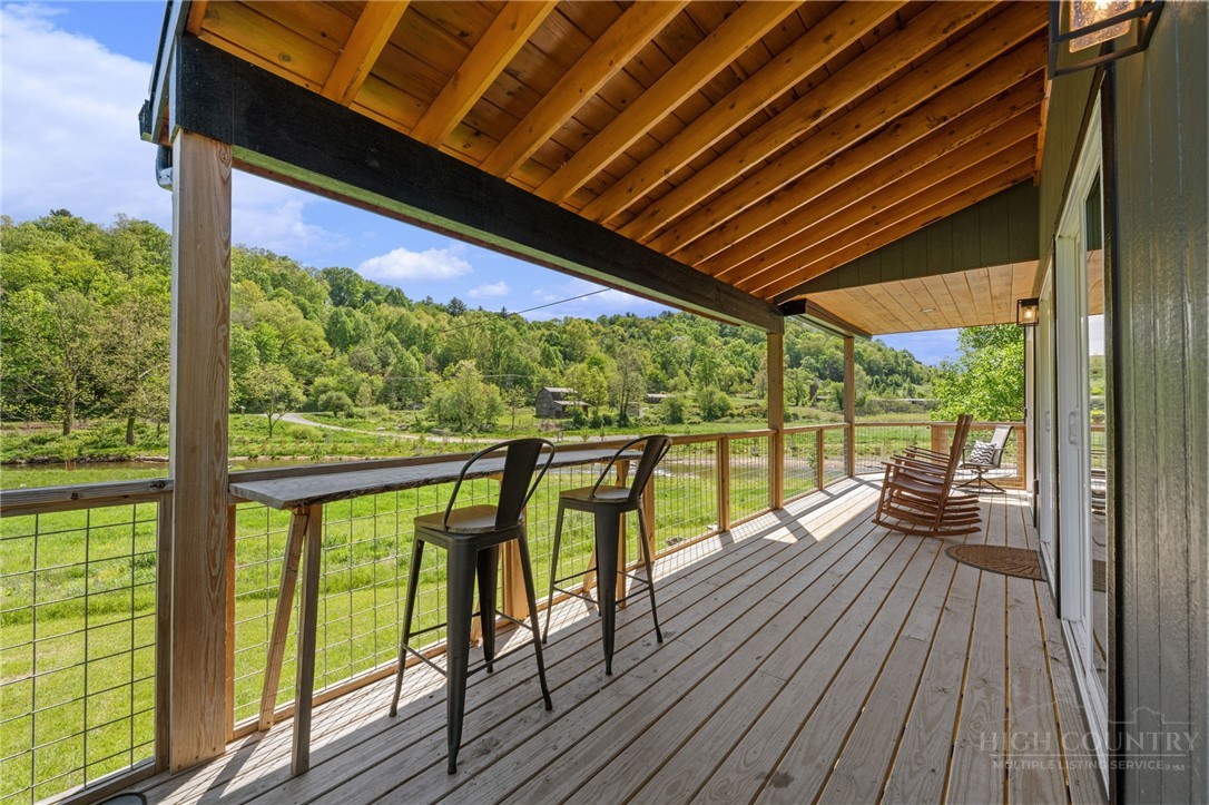634-636 Watauga River Road Sugar Grove, NC 28679 - Photo 45 of 50 a view of two chairs in the balcony