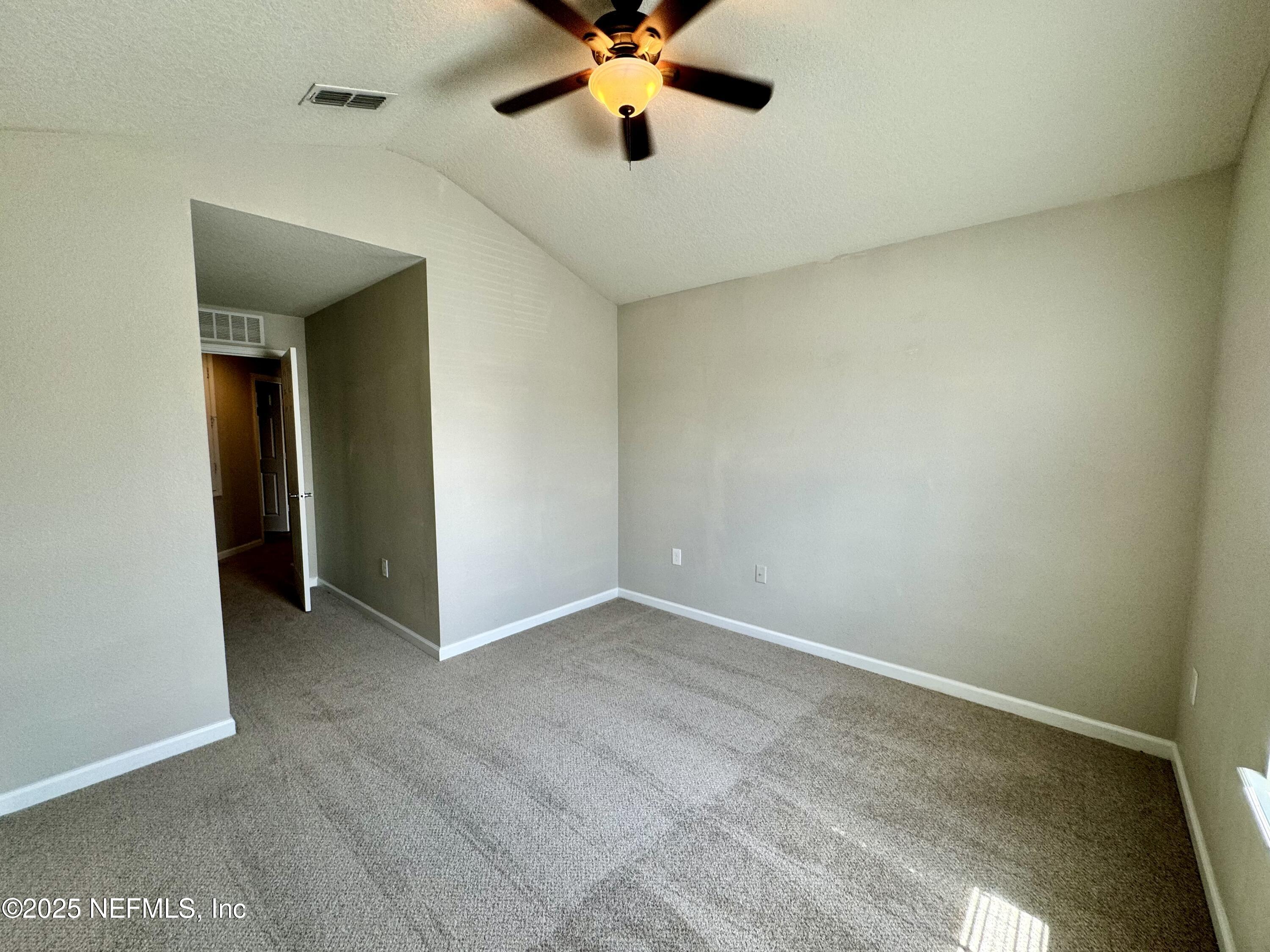 6839 Roundleaf Drive Jacksonville, FL 32258 - Photo 14 of 30 a view of an empty room with window