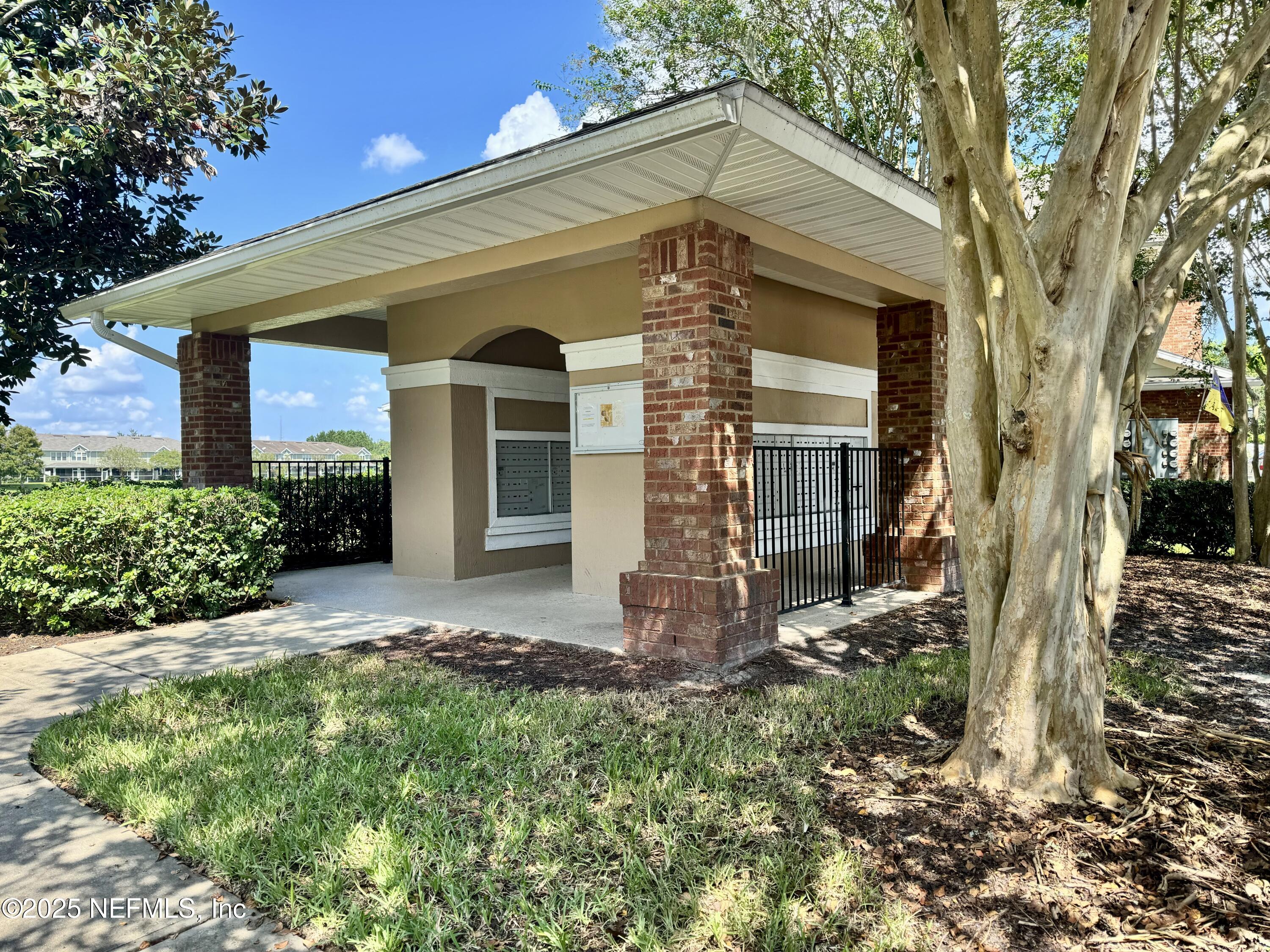 6839 Roundleaf Drive Jacksonville, FL 32258 - Photo 28 of 30 a front view of a house with garden