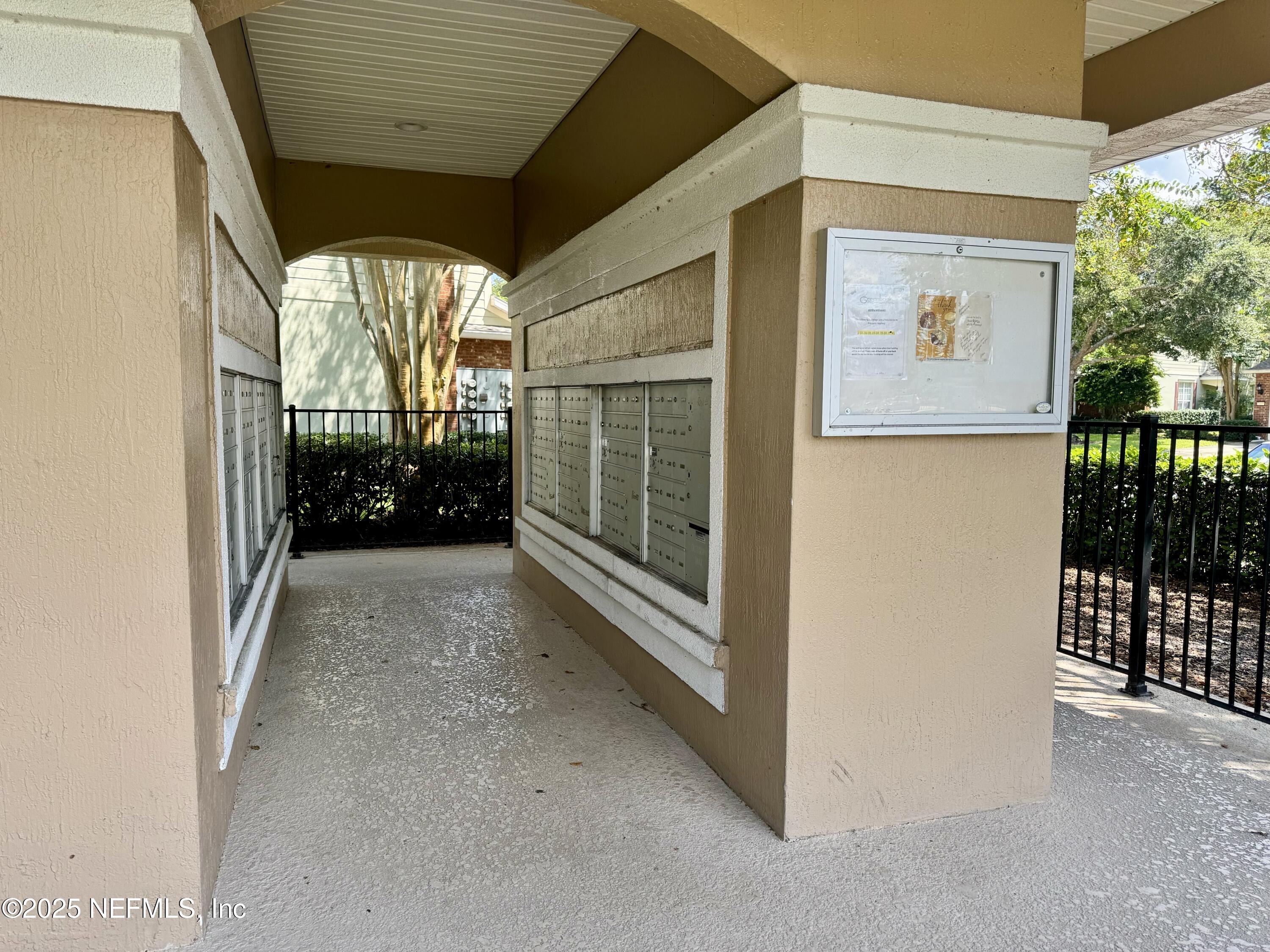 6839 Roundleaf Drive Jacksonville, FL 32258 - Photo 29 of 30 a view of porch with furniture and a yard