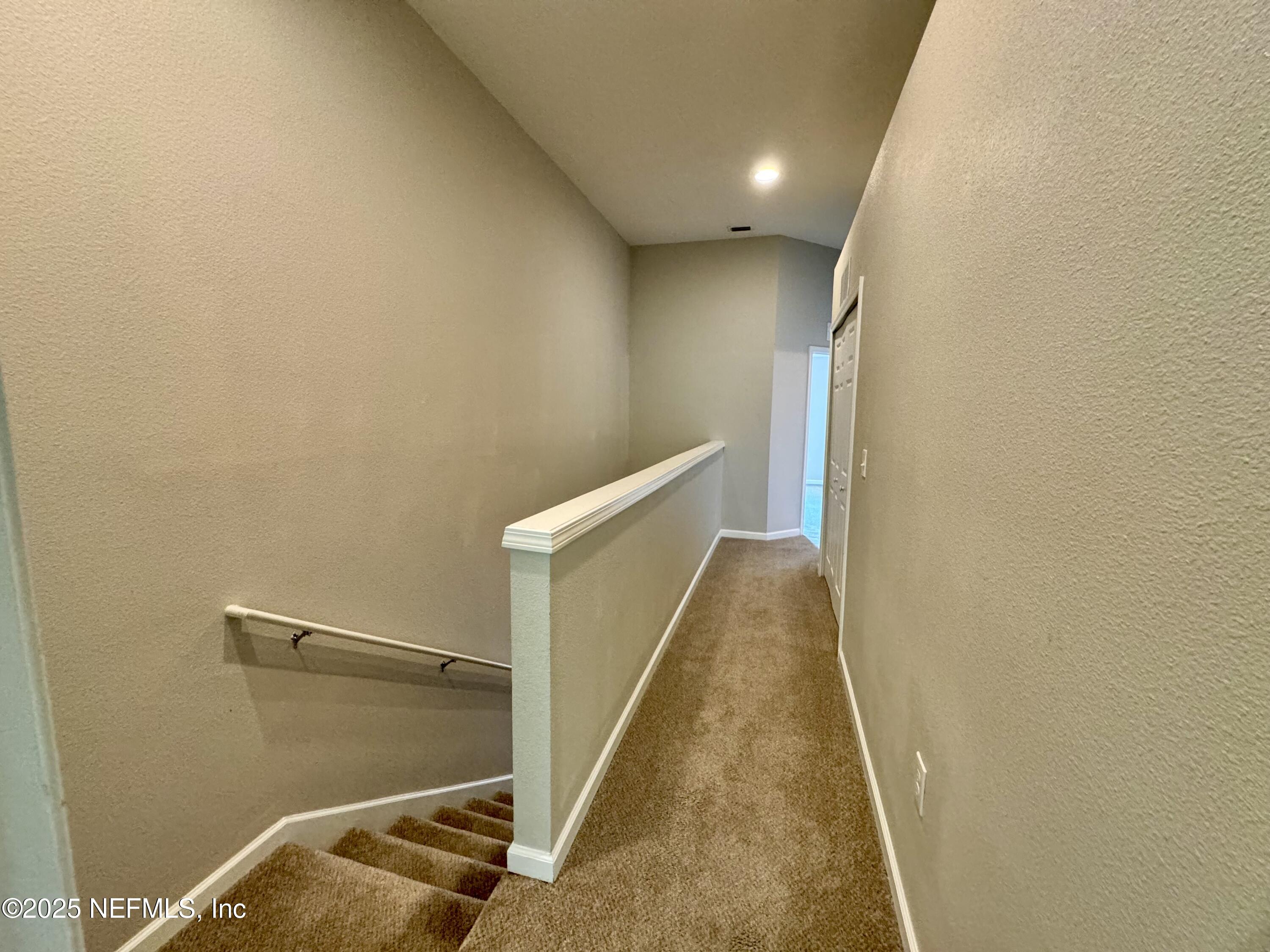 6839 Roundleaf Drive Jacksonville, FL 32258 - Photo 8 of 30 a view of a hallway with staircase