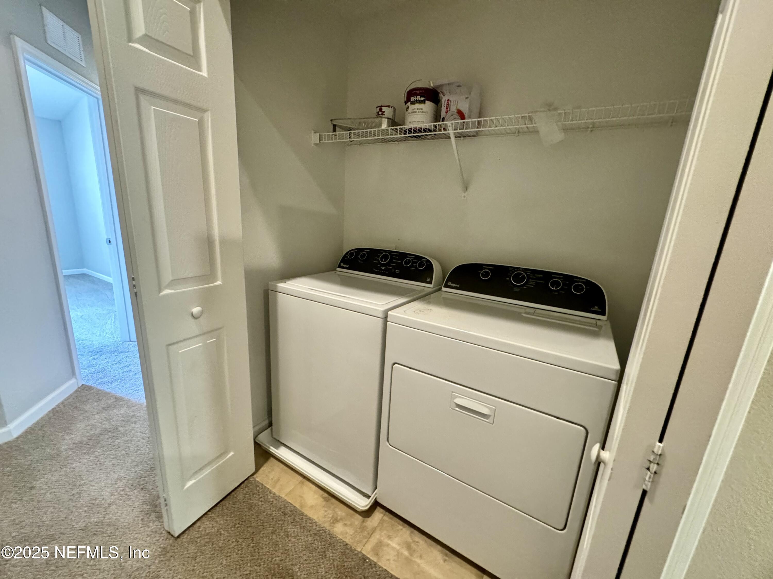 6839 Roundleaf Drive Jacksonville, FL 32258 - Photo 9 of 30 a utility room with dryer and washer
