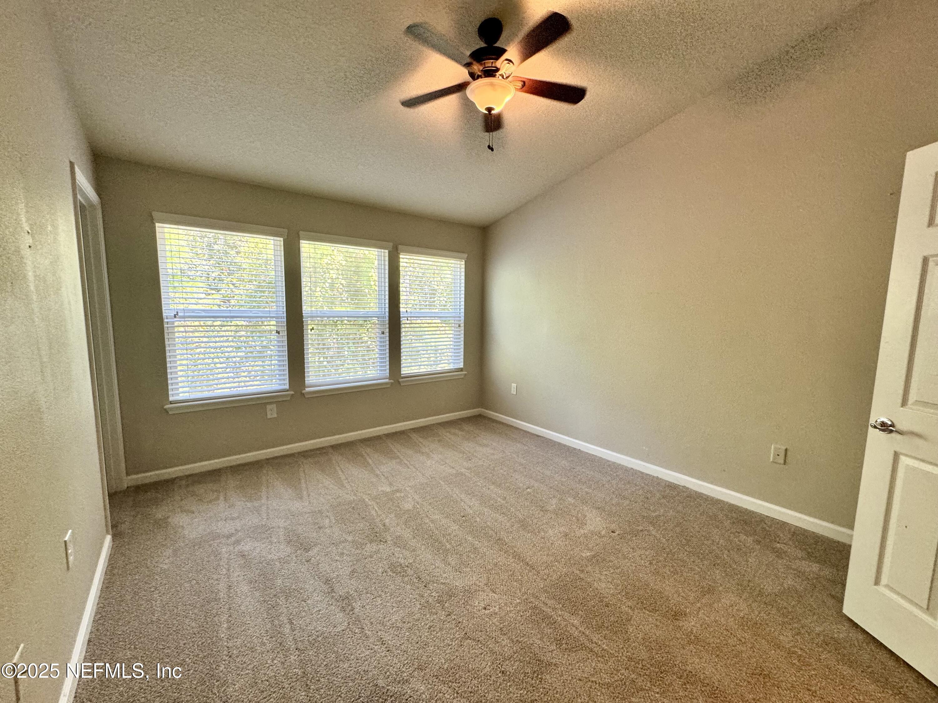 6839 Roundleaf Drive Jacksonville, FL 32258 - Photo 10 of 30 a view of an empty room and window