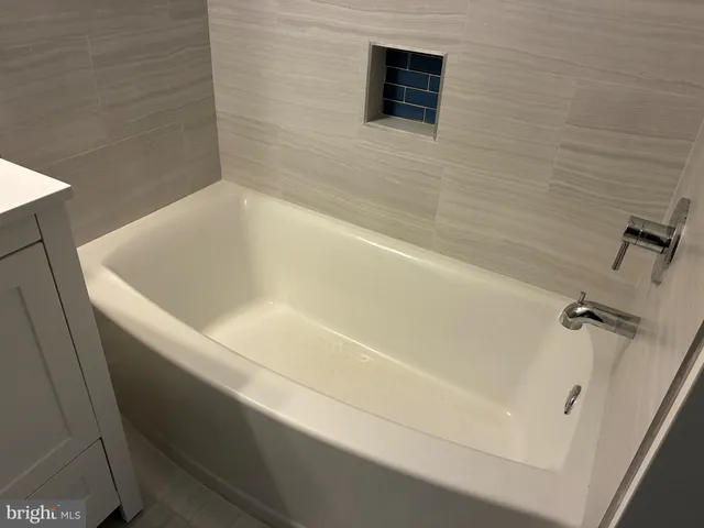 a bathroom with a bathtub