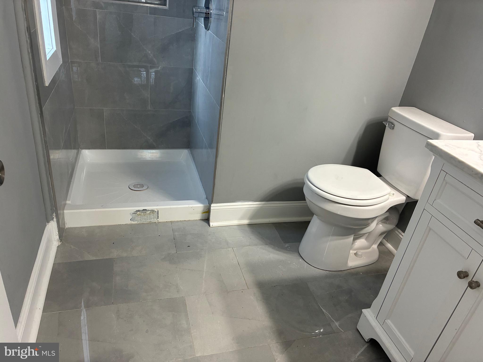 80 East 3rd Street Moorestown, NJ 08057 - Photo 21 of 37 a bathroom with a toilet and a shower