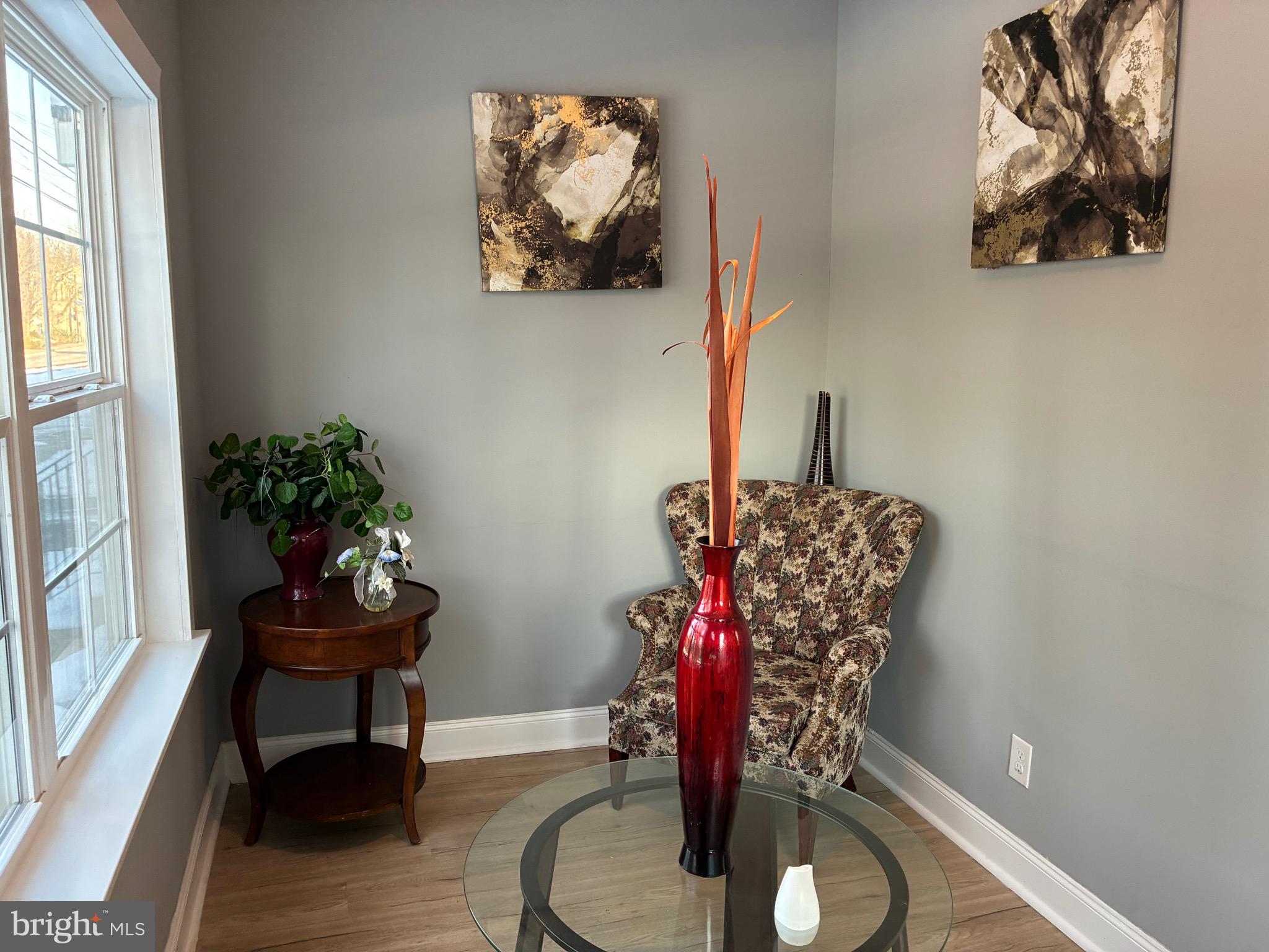 80 East 3rd Street Moorestown, NJ 08057 - Photo 4 of 37 a living room with furniture and a potted plant