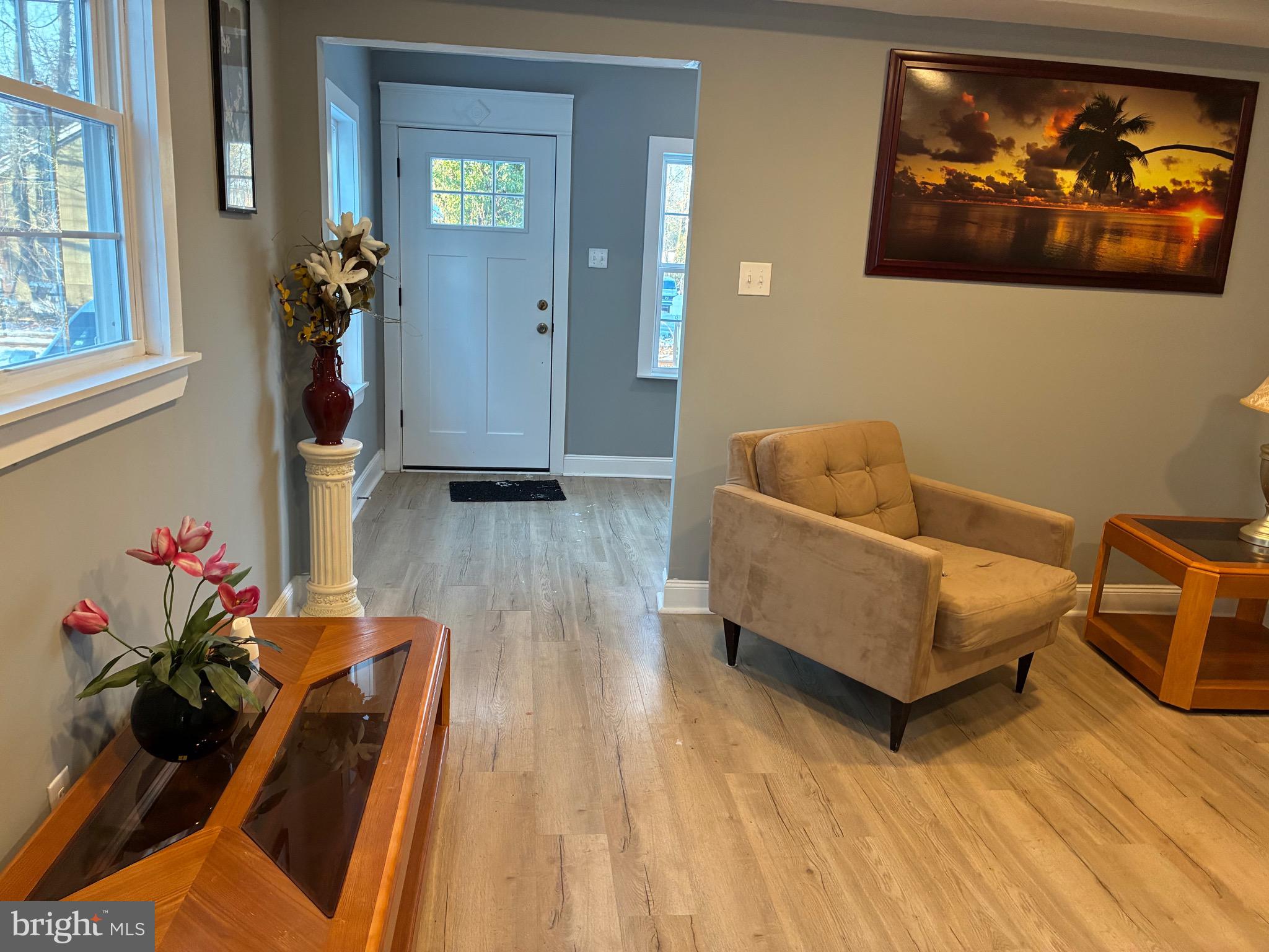 80 East 3rd Street Moorestown, NJ 08057 - Photo 6 of 37 a living room with furniture and wooden floor