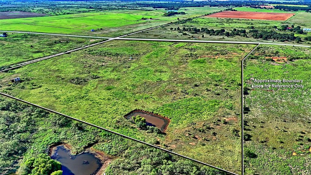 174 Windthorst Tx 76389 Henrietta, TX 76365 - Photo 17 of 18 a view of a yard from a balcony
