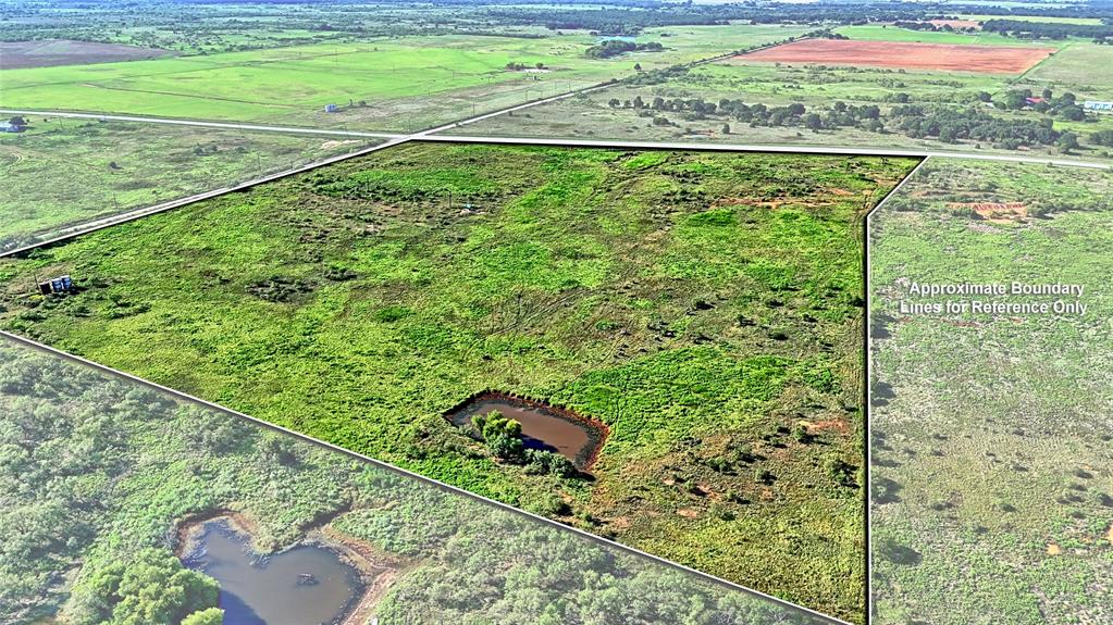 174 Windthorst Tx 76389 Henrietta, TX 76365 - Photo 18 of 18 a view of a garden from a balcony