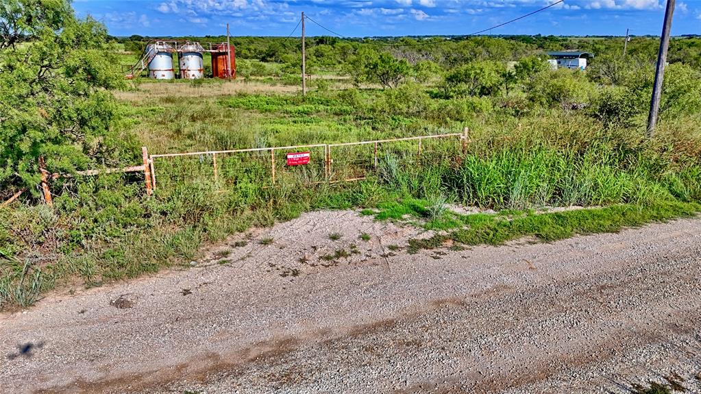174 Windthorst Tx 76389 Henrietta, TX 76365 - Photo 6 of 18 a view of a backyard