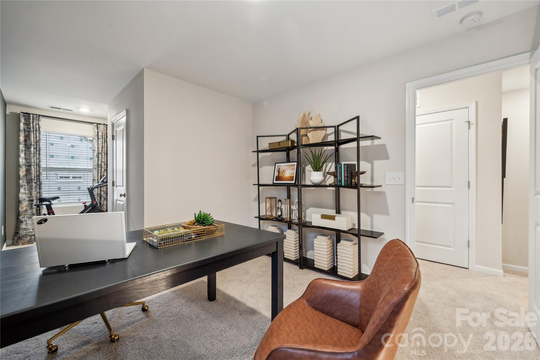 5853 Tuckaseegee Road, Unit 5 Charlotte, NC 28208 - Photo 11 of 24 a workspace with furniture and window