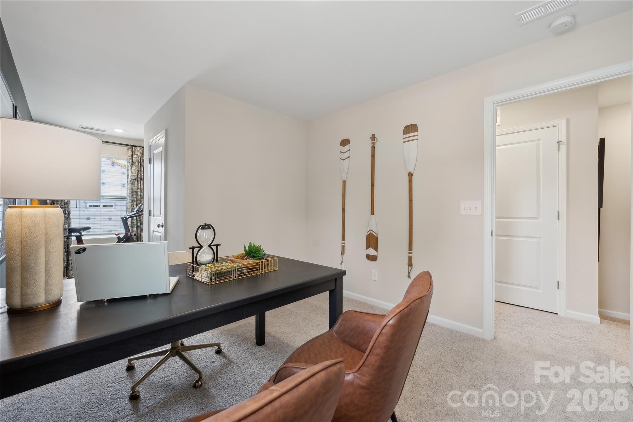 5853 Tuckaseegee Road, Unit 5 Charlotte, NC 28208 - Photo 18 of 24 a view of a dining room with furniture