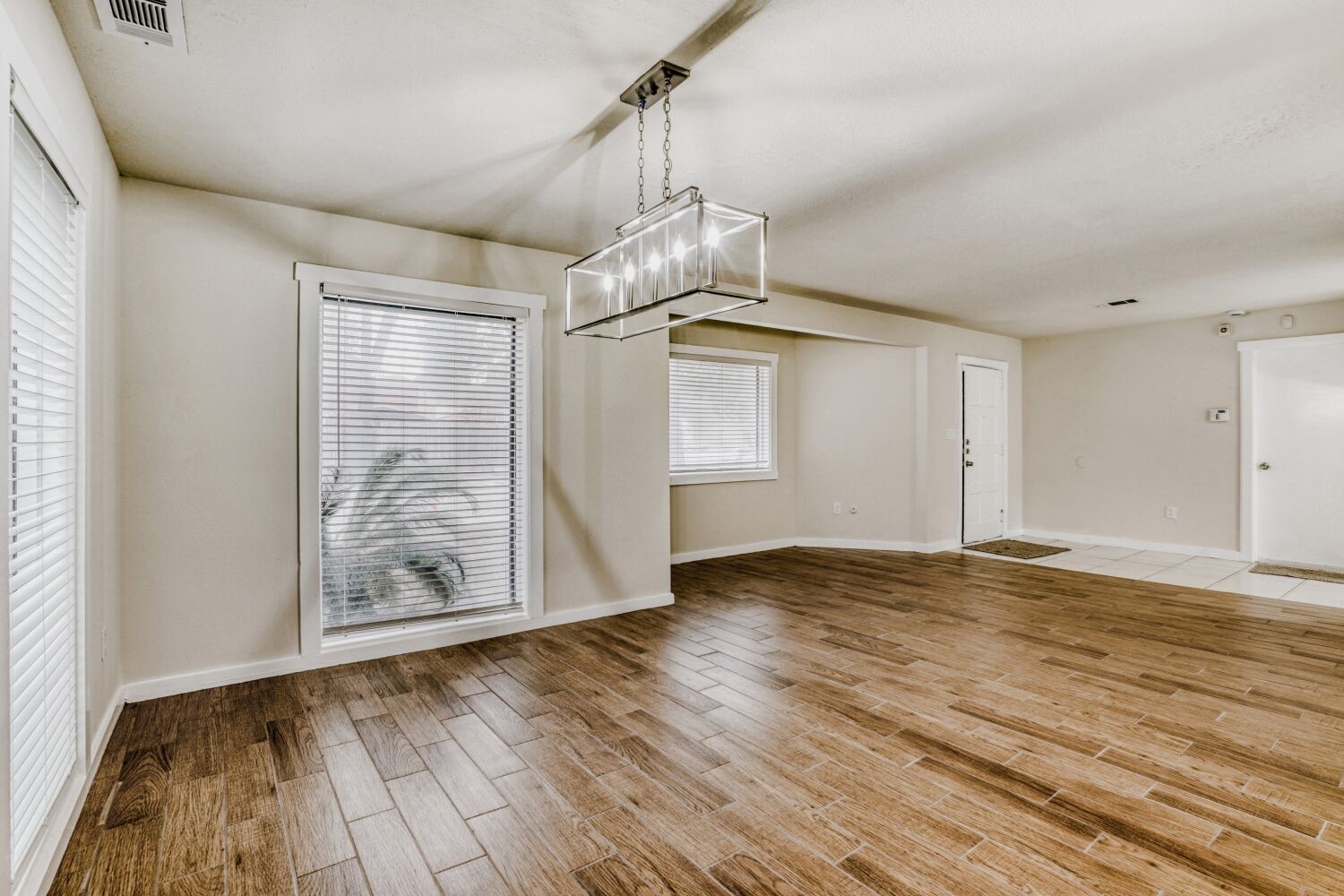 17804 Paddle Wheel Drive Spring, TX 77379 - Photo 1 of 17 a view of empty room with wooden floor and fan