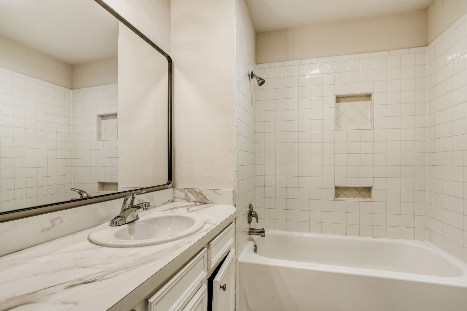 17804 Paddle Wheel Drive Spring, TX 77379 - Photo 12 of 17 a bathroom with a sink and a bathtub