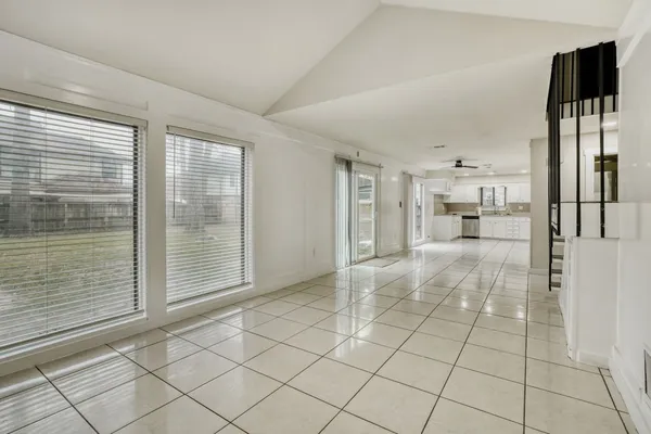 a view of a kitchen with windows