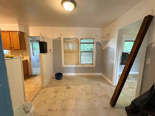 a bathroom with a sink toilet vanity and tub