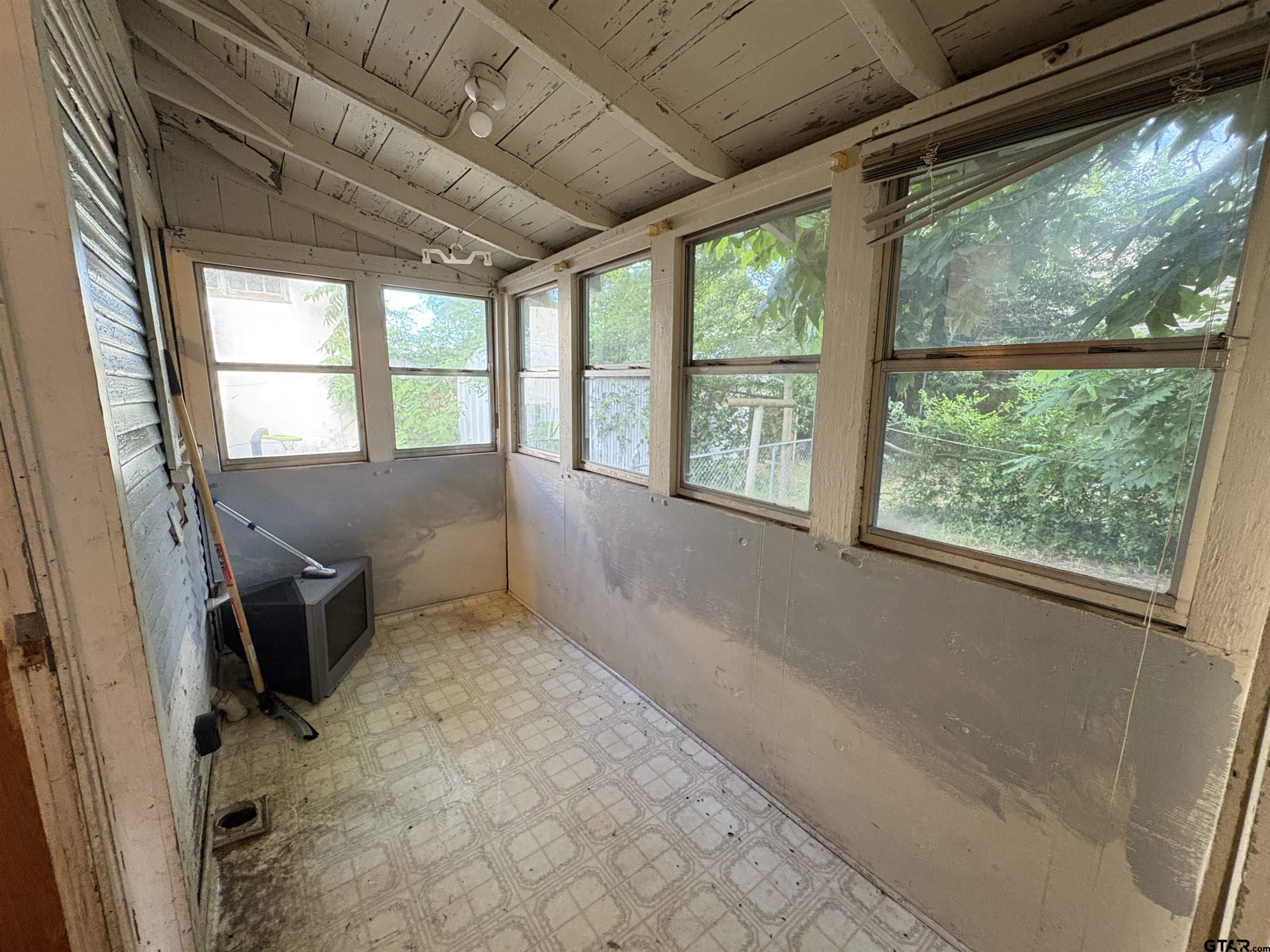 110 East 9th Street Mount Pleasant, TX 75455 - Photo 26 of 27 a view of an empty room with a window