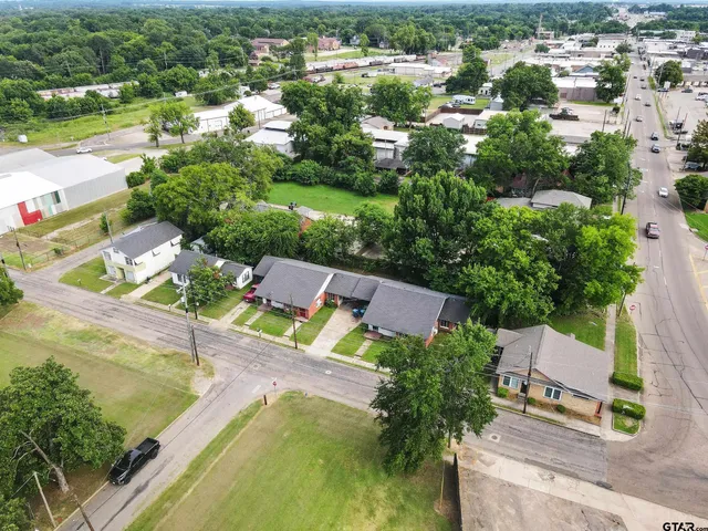 an aerial view of a building with outdoor space