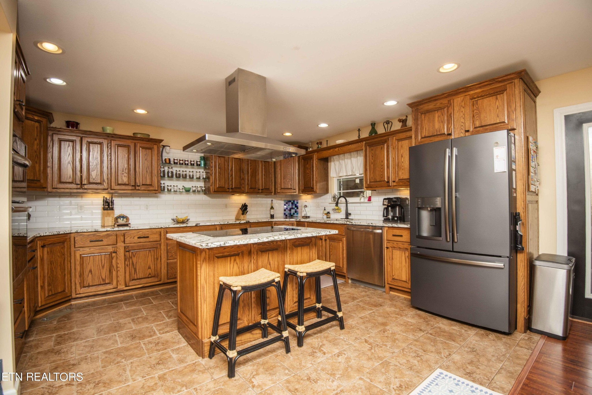 174 Spring Cove Lane Spring City, TN 37381 - Photo 13 of 50 a kitchen with cabinets and stainless steel appliances