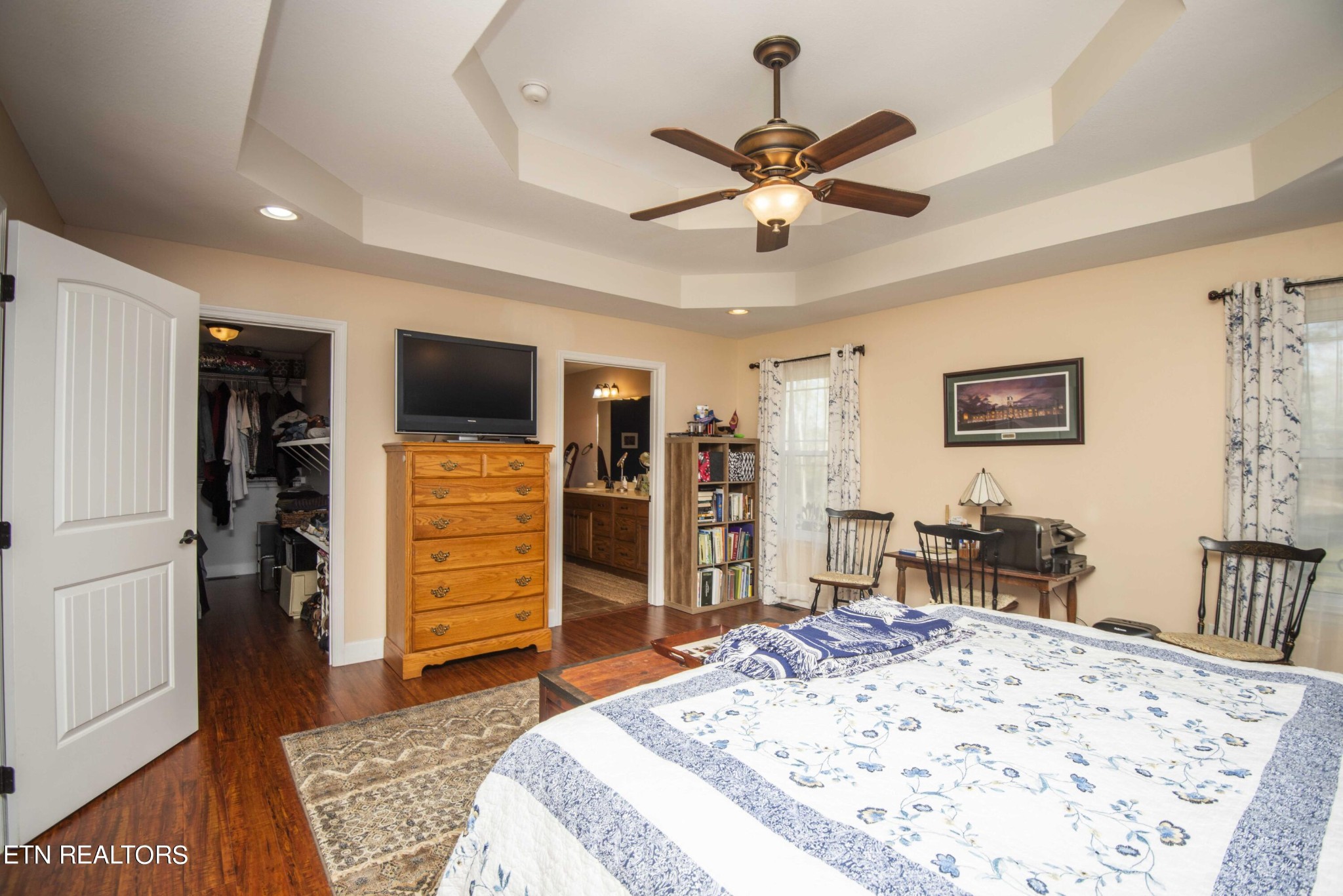 174 Spring Cove Lane Spring City, TN 37381 - Photo 16 of 50 a bedroom with a bed and a dresser in it