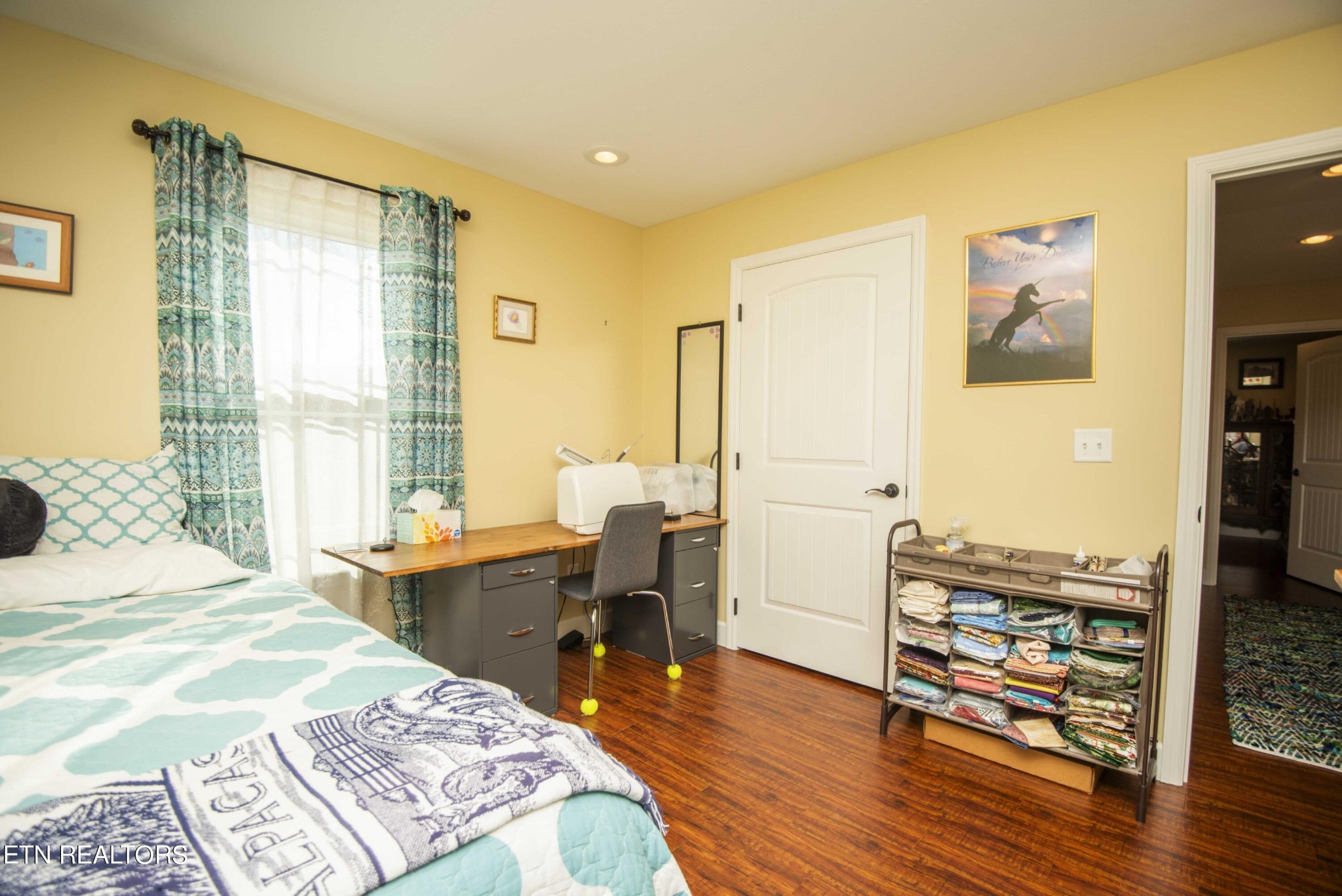 174 Spring Cove Lane Spring City, TN 37381 - Photo 25 of 50 a bed room with a bed and a table