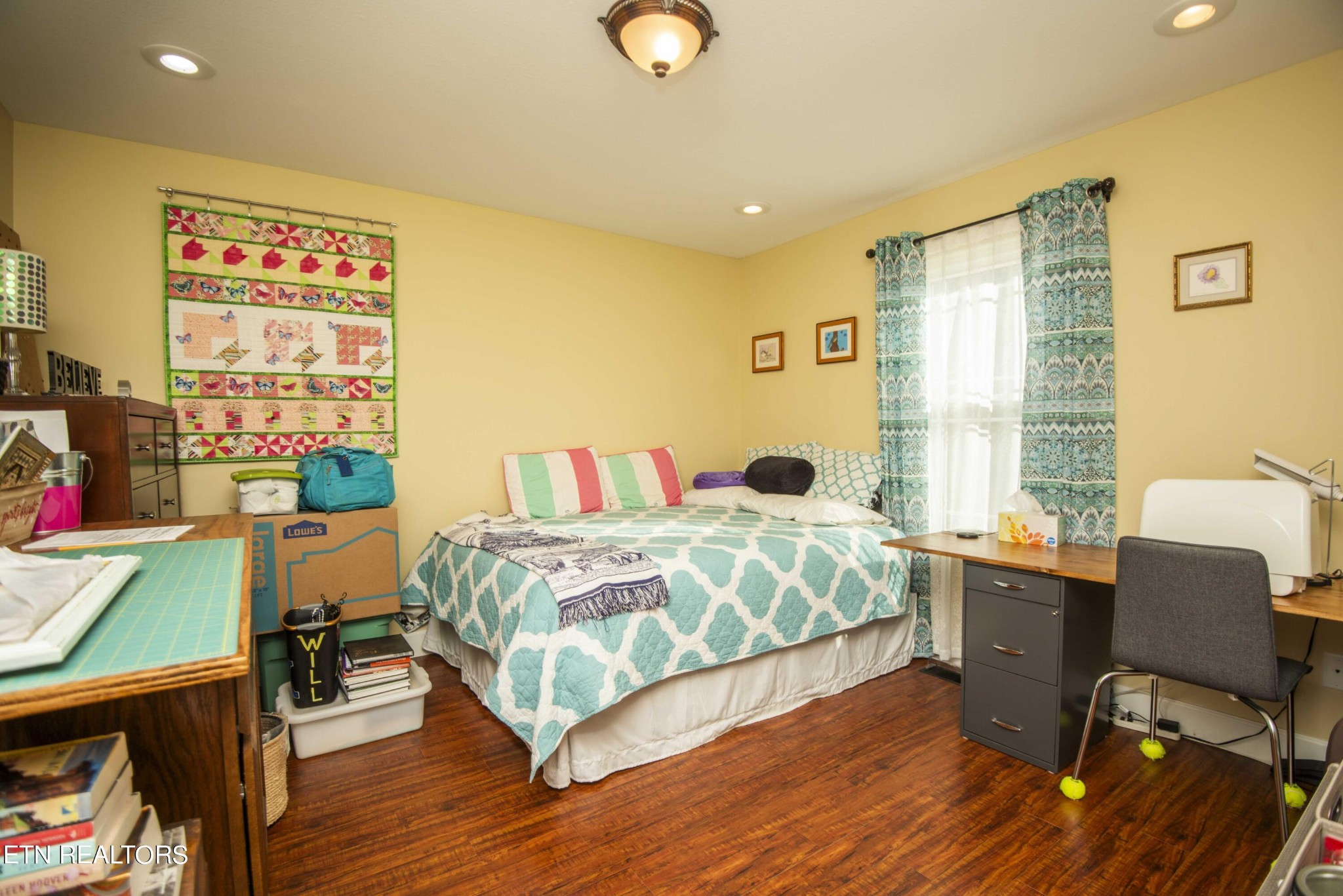 174 Spring Cove Lane Spring City, TN 37381 - Photo 26 of 50 a bedroom with a bed and wooden floor