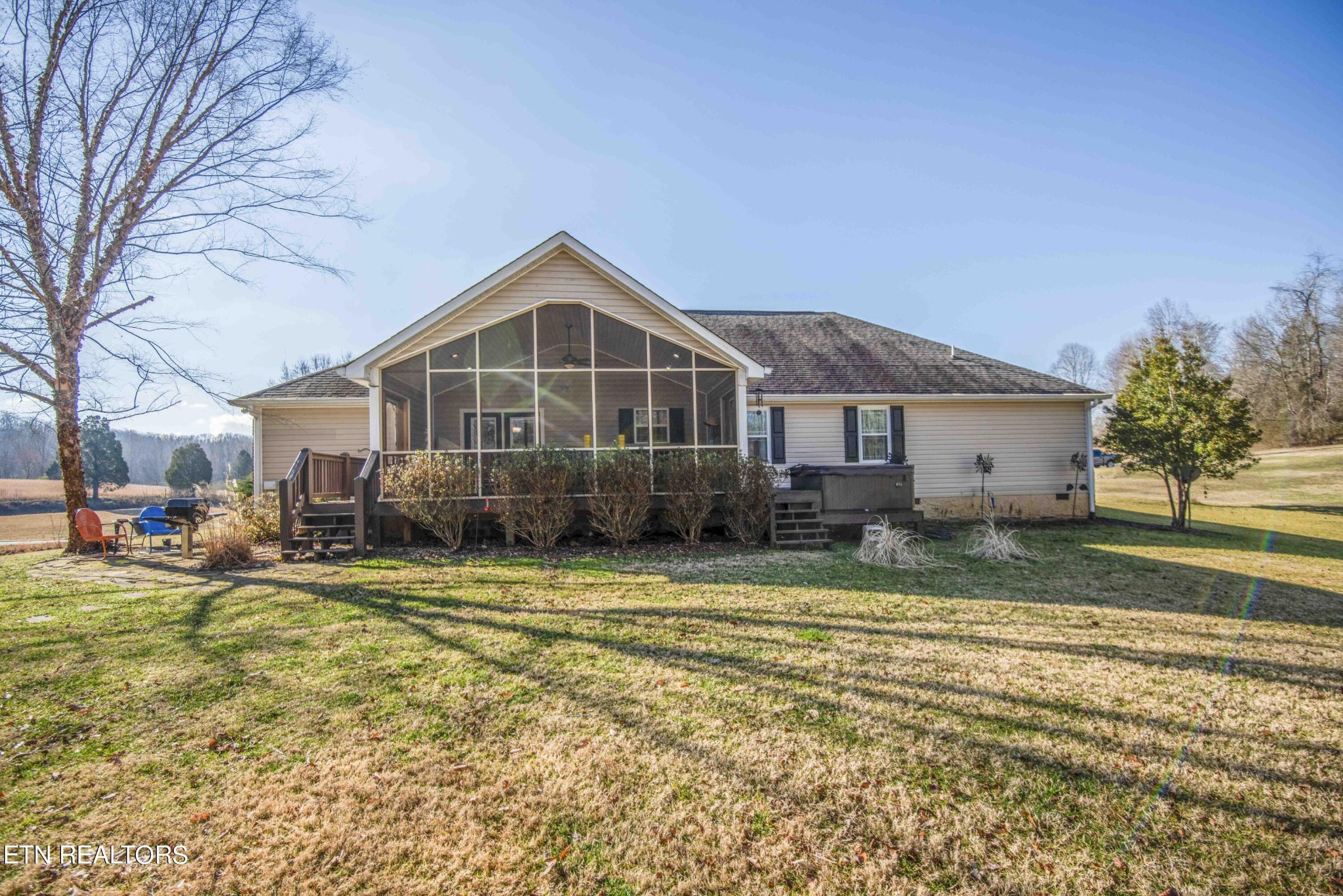 174 Spring Cove Lane Spring City, TN 37381 - Photo 32 of 50 a view of a house with a yard