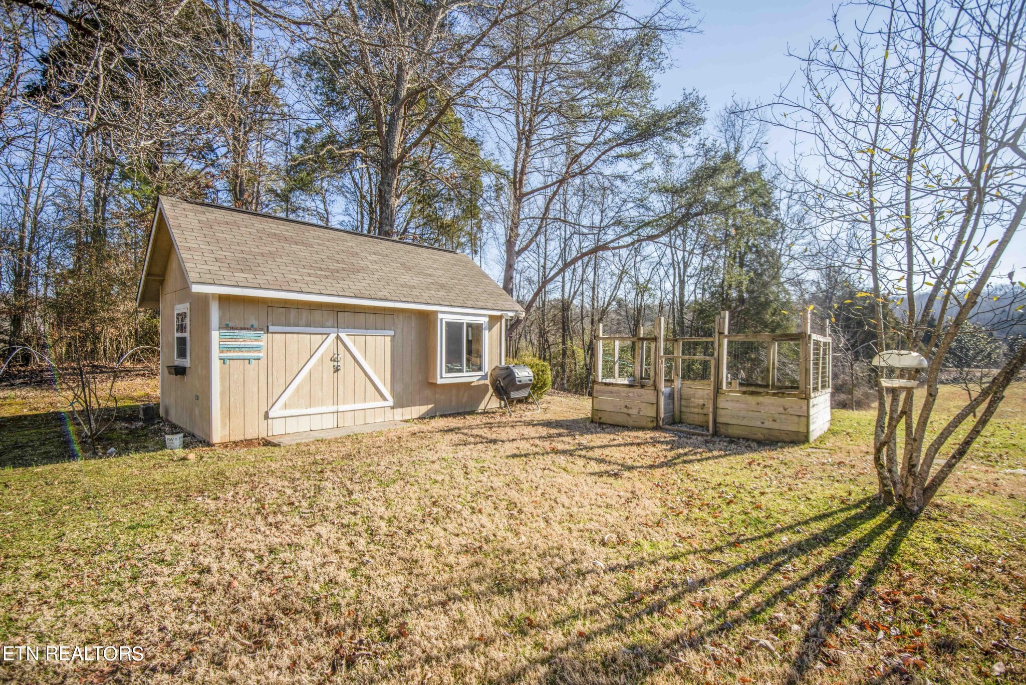 174 Spring Cove Lane Spring City, TN 37381 - Photo 35 of 50 a view of a house with snow on the wall