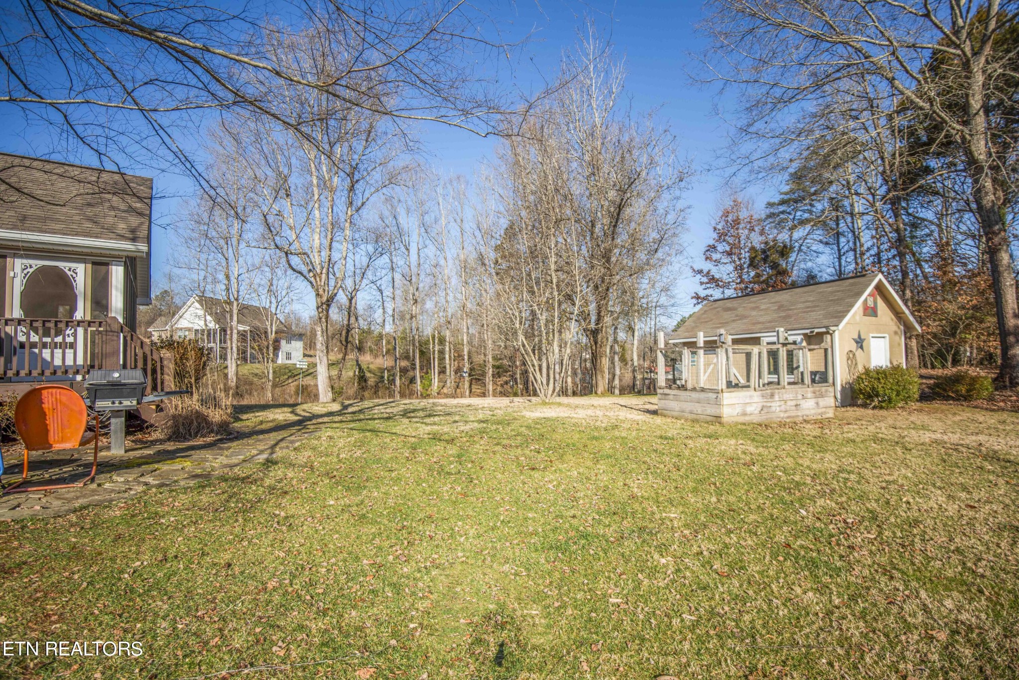 174 Spring Cove Lane Spring City, TN 37381 - Photo 36 of 50 a view of a house with a patio