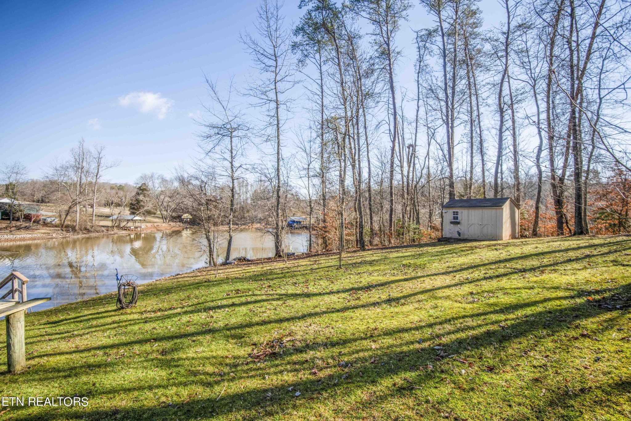 174 Spring Cove Lane Spring City, TN 37381 - Photo 39 of 50 a swimming pool with an outdoor space and seating area